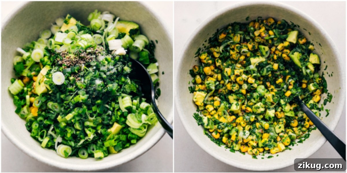 Mexican Street Corn Topping for Loaded Sweet Potatoes Recipe The vibrant Mexican street corn topping, featuring corn, green onions, cilantro, and jalapeño, mixed together in a bowl.