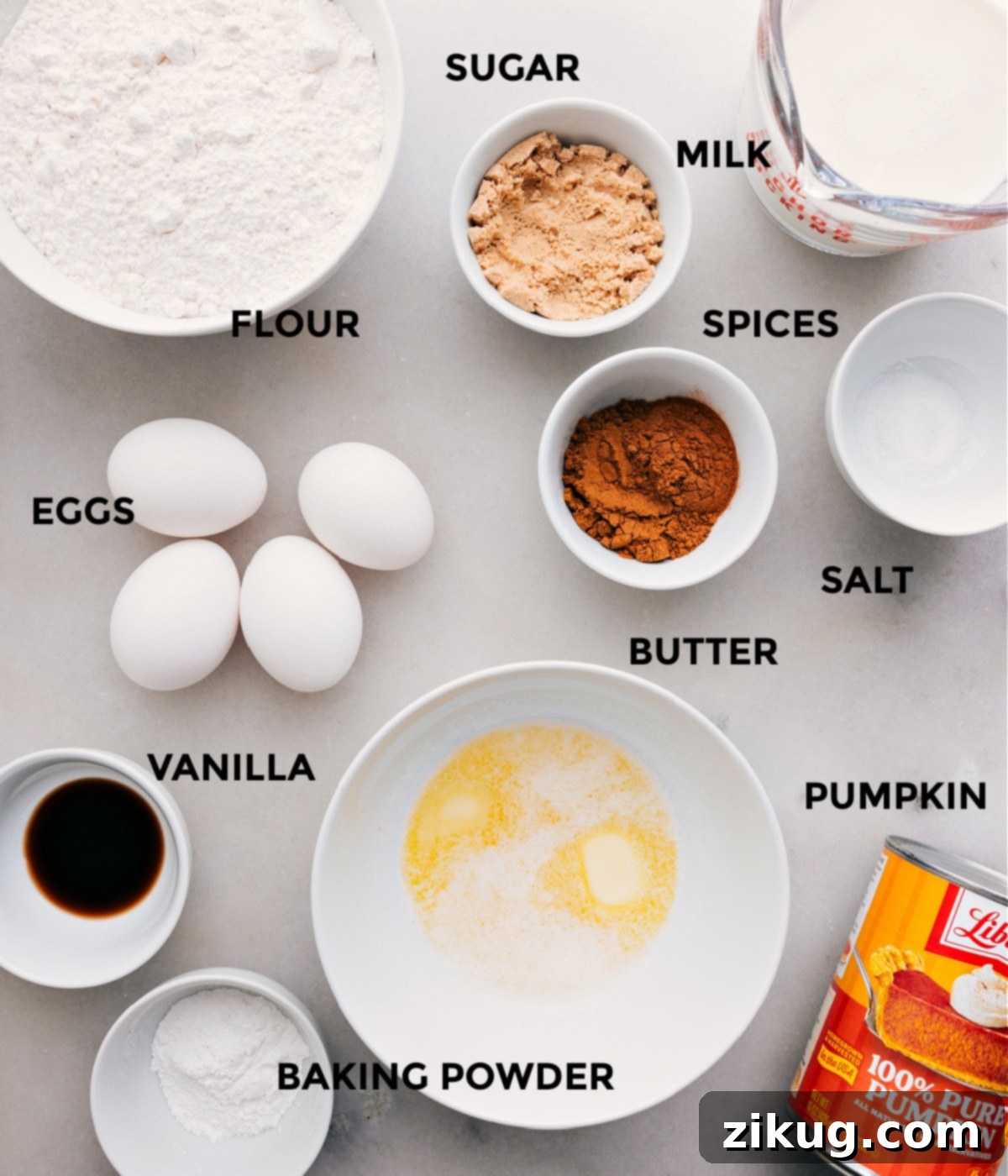 Ingredients In Pumpkin Waffles Recipe All the ingredients for pumpkin waffles prepped and displayed on a counter: flour, sugar, milk, spices, salt, butter, eggs, baking powder, vanilla, and pumpkin puree.