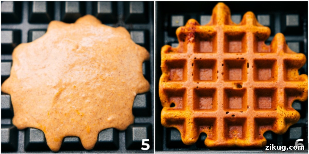 Cooking Up The Pumpkin Waffles The golden brown pumpkin waffle batter being poured into the waffle maker and cooked to perfection.
