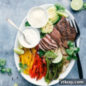 Close-up of a sizzling plate of steak fajitas