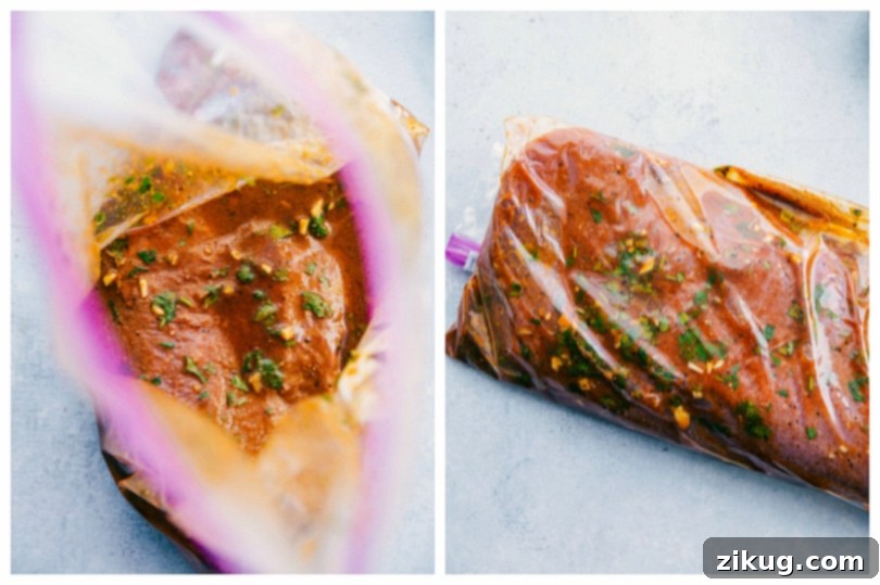 Our Favorite Steak Fajitas marinading Steak marinating in a sealable bag with the marinade.