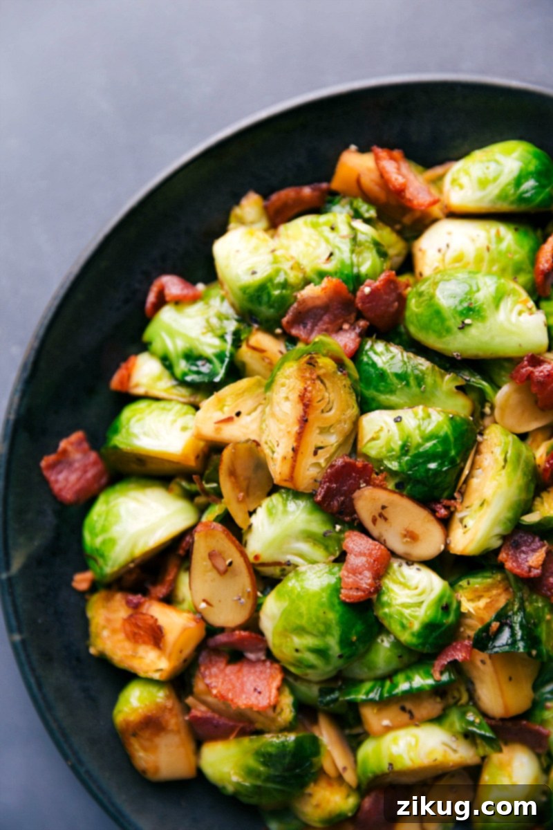 Ready-to-Eat Brussels Sprouts and Bacon A serving of finished Brussels sprouts and bacon, beautifully plated and ready to be enjoyed, highlighting the texture and color.