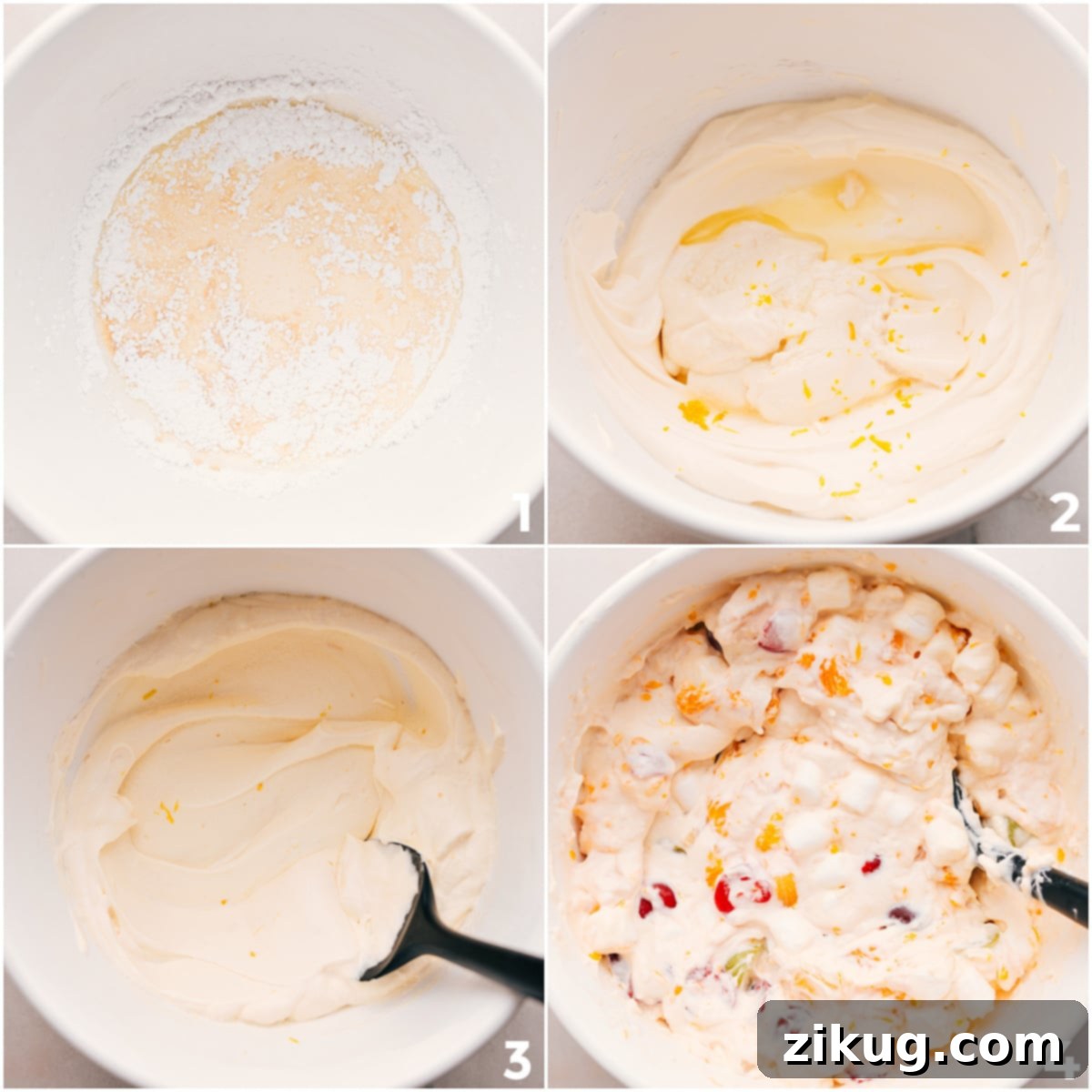 How To Add The Cream Layer To The Ambrosia Salad The fluffy, creamy whipped dressing being gently folded into the vibrant mixture of fruits and marshmallows in a large glass bowl, ensuring an even coating without crushing the ingredients.