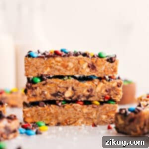 A plate of freshly cut homemade chewy granola bars, ready to be enjoyed.