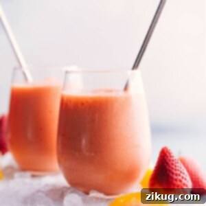 A vibrant Caribbean Passion Smoothie in a glass, ready to be enjoyed.