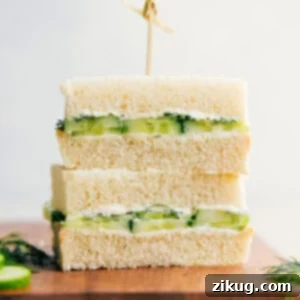 Refreshing Cucumber Sandwiches 2 Cucumber Sandwich recipe stacked on top of each other.