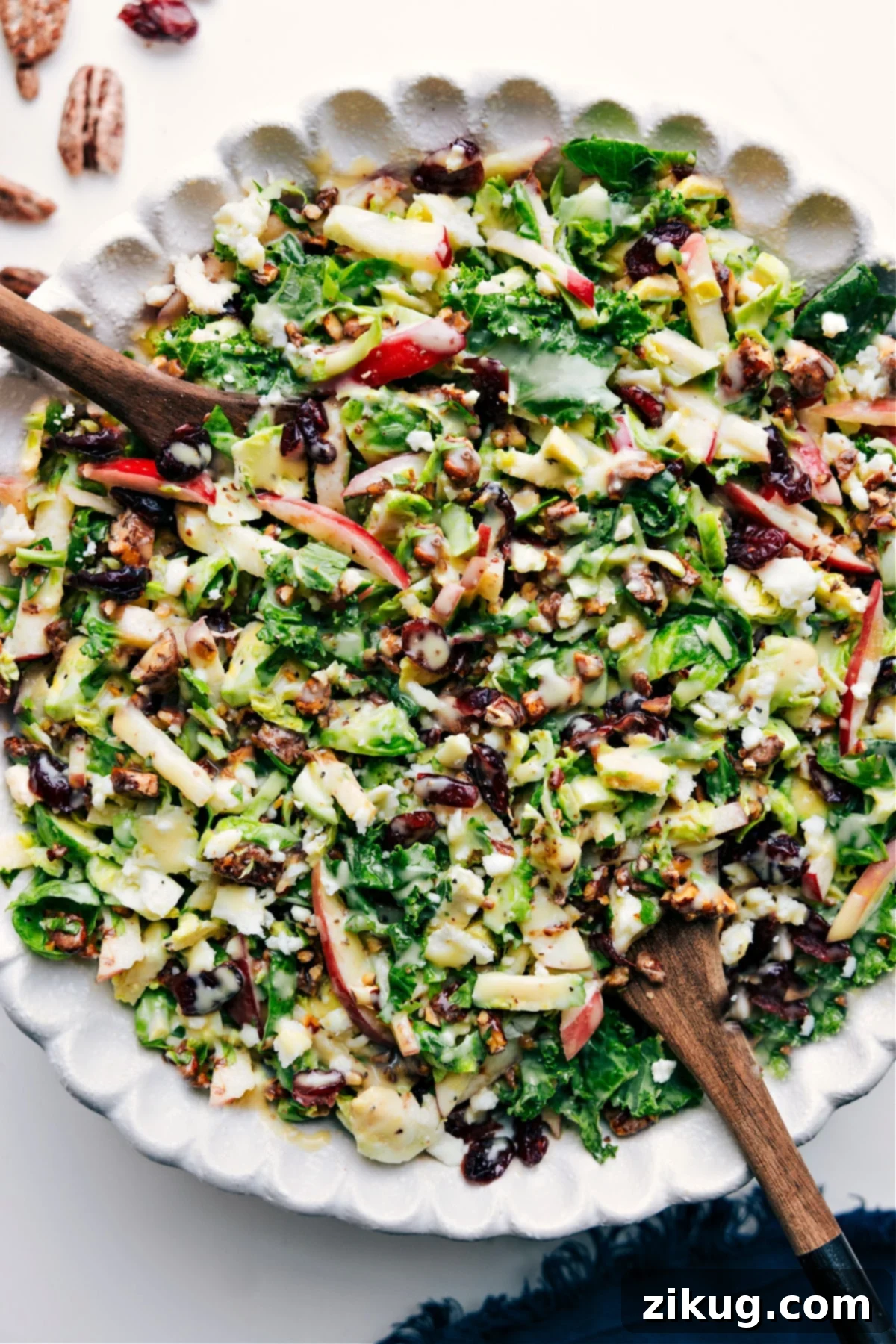 Brussel Sprout Salad Recipe In A Bowl Bowl of Brussels Sprout Salad Recipe tossed with dressing and ready to eat