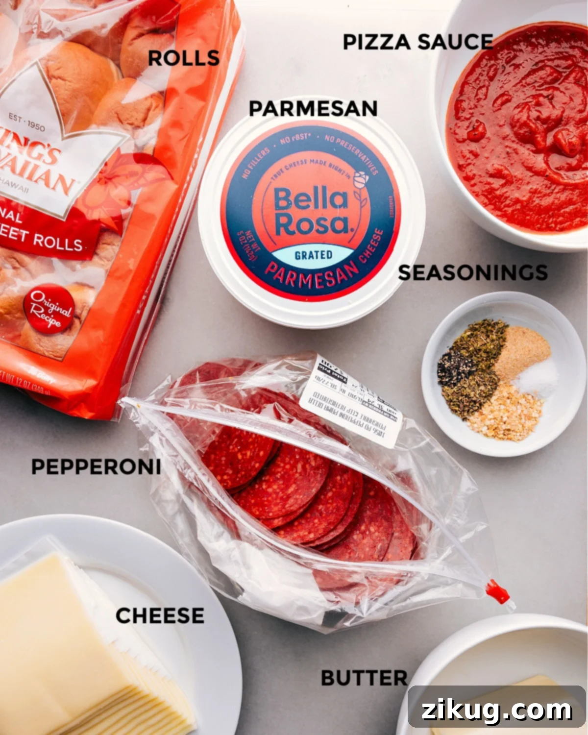 Pizza Sliders Ingredients All the ingredients for making Pizza Sliders laid out on a table.