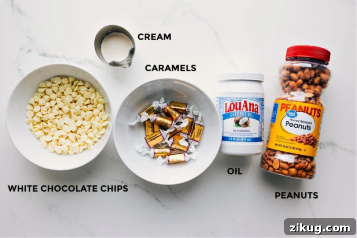 Ingredients In Polar Bear Paws Ingredients for Polar Bear Paws: white chocolate chips, cream, caramels, oil, and peanuts.