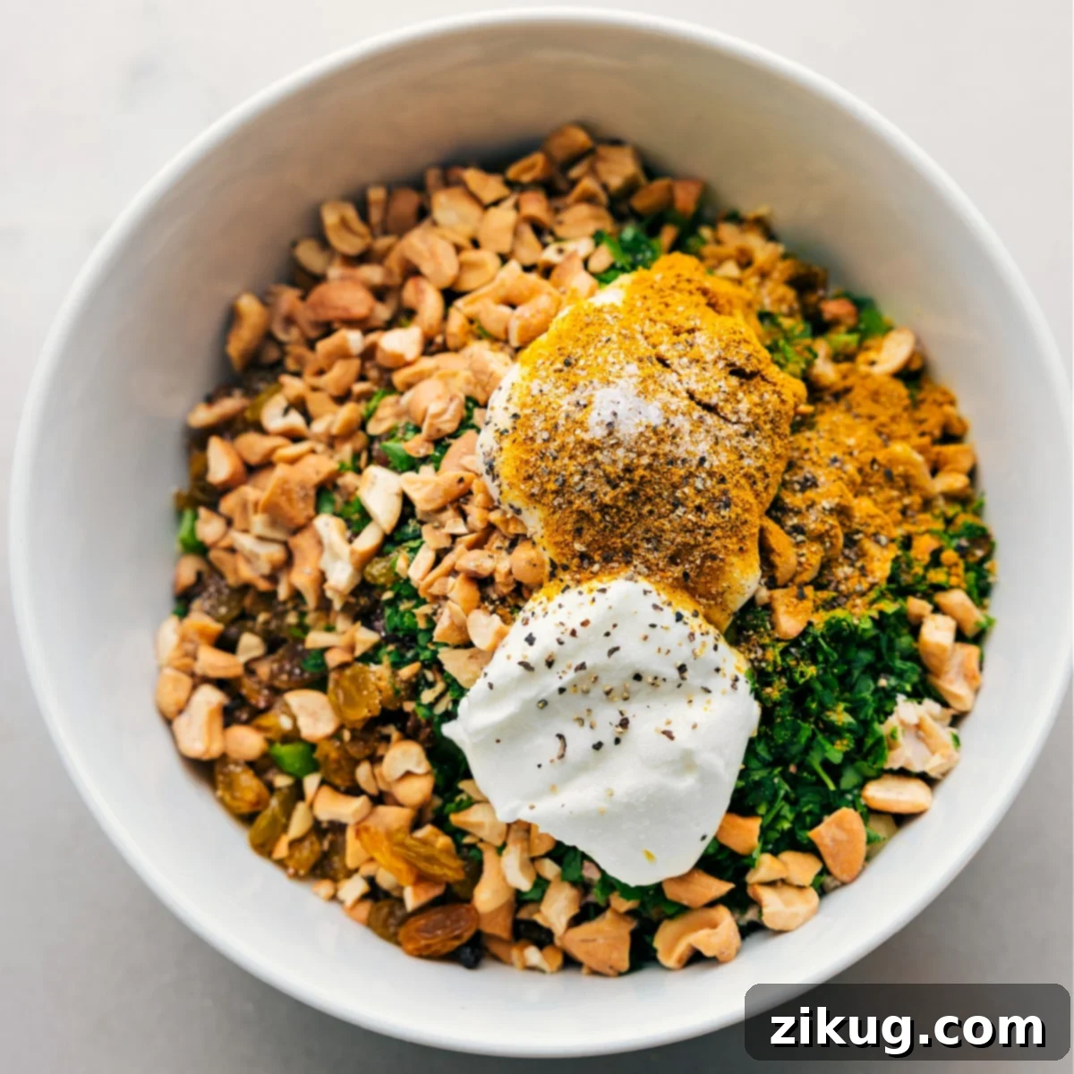Curried Chicken Salad Delight 3 All Curry Chicken Salad ingredients in a bowl, ready to be mixed