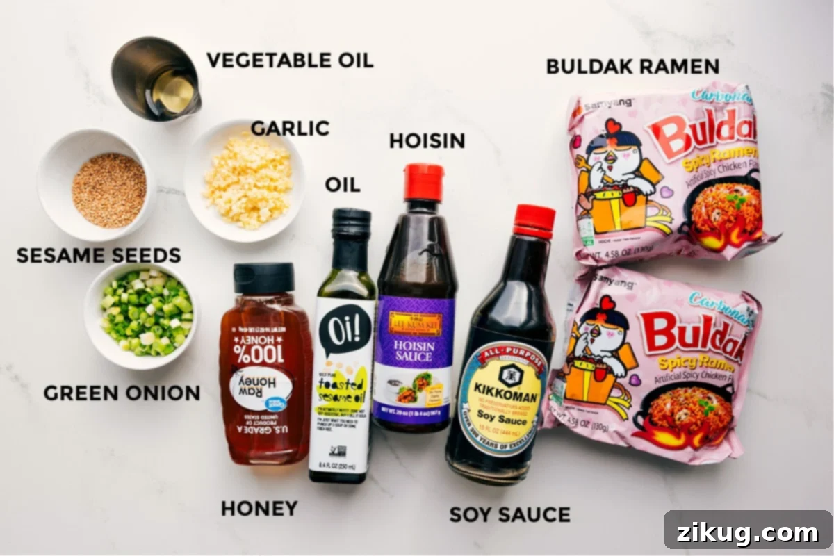 Ingredients for Asian Noodle Recipe All the essential ingredients for a perfect Asian noodle recipe, prepped and laid out for quick assembly: Buldak ramen, hoisin, soy sauce, honey, toasted sesame oil, vegetable oil, fresh garlic, green onions, and sesame seeds.