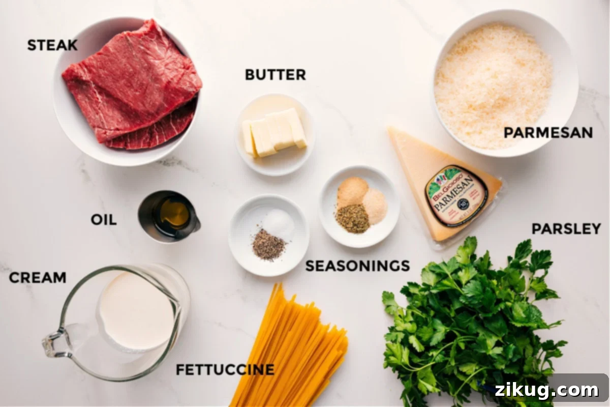 Ingredients In Steak Alfredo Recipe All the ingredients in this recipe prepped out for easy assembly including the steak, butter, oil, cream, seasonings, fettuccine, parsley, and parmesan.