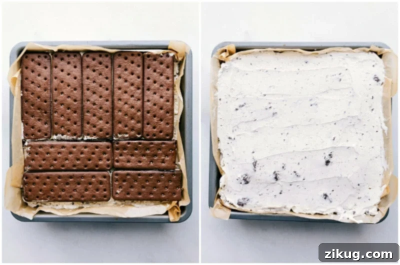 Applying Final Layers of Ice Cream Sandwich Cake The final layers being carefully added and smoothed for this easy and delicious ice cream sandwich cake, showing the whipped topping and crushed Oreos.