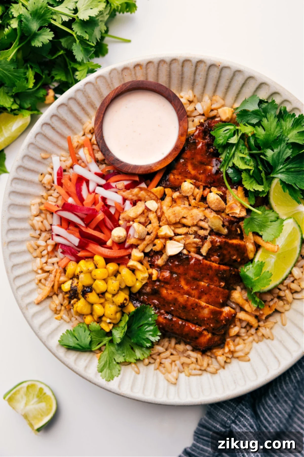 Savory Asian Chicken Bowl Recipe A flavorful Asian Chicken Bowl with tender chicken, fluffy rice, crisp stir-fried vegetables, and a savory Asian-inspired sauce, ideal for a quick and healthy dinner.