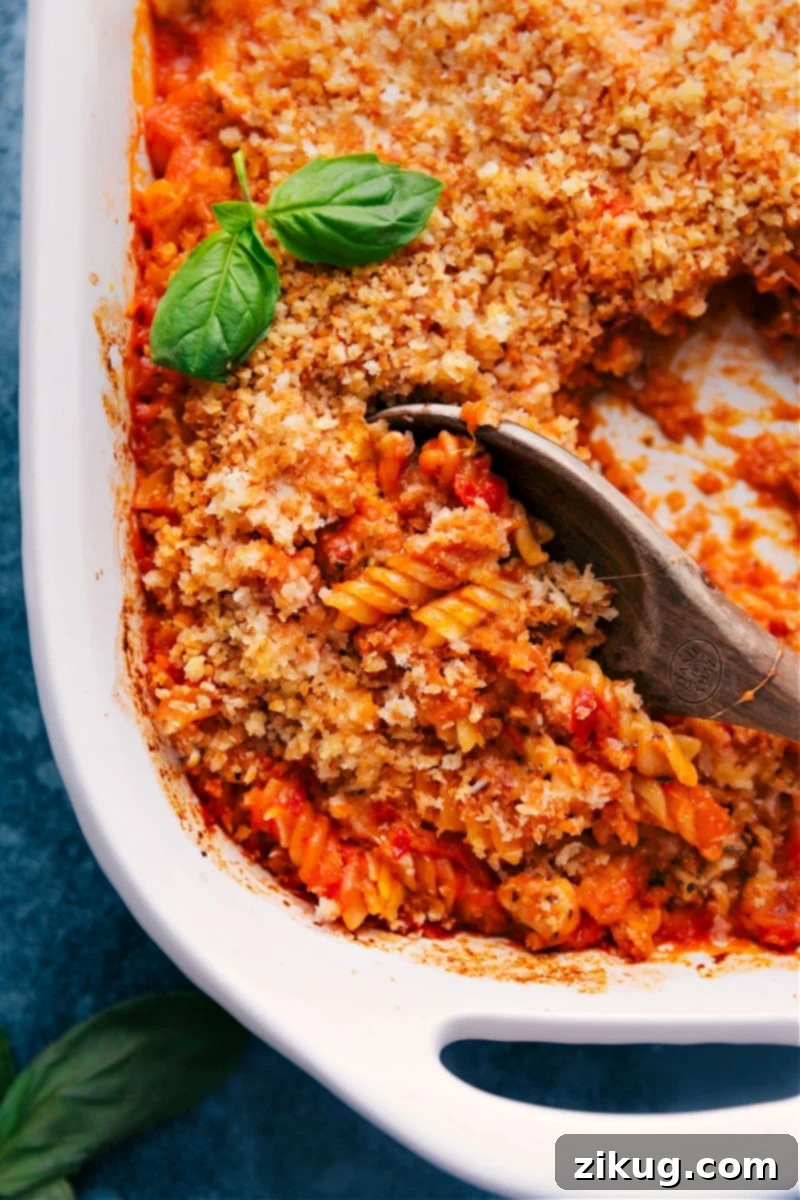 Effortless One Pan Chicken Parmesan Pasta One Pan Chicken Parmesan Pasta, a simple and cheesy dinner baked to perfection in a single dish.