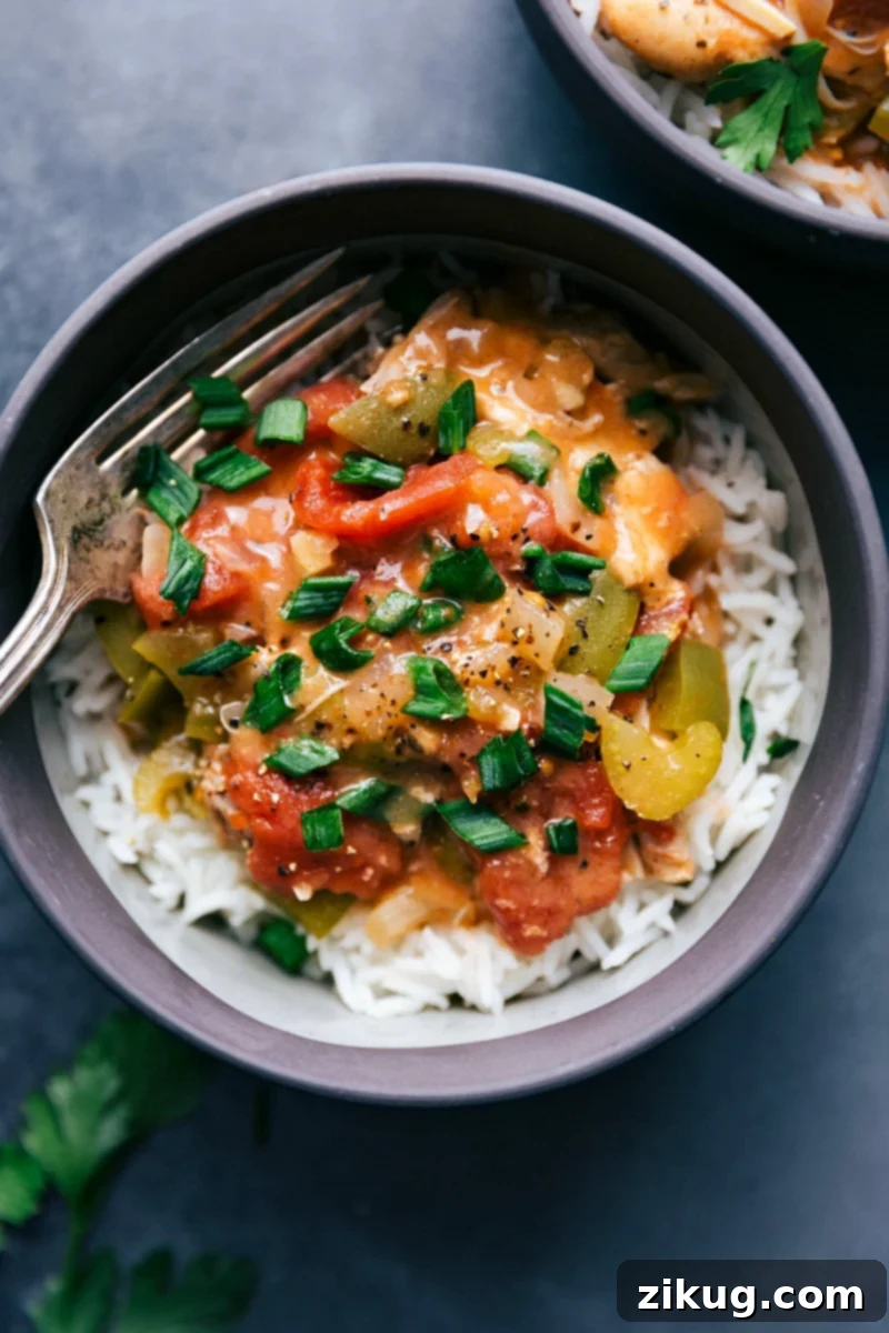 Hearty Crockpot Cajun Chicken Succulent Crockpot Cajun Chicken complete with tender vegetables and a rich, spicy broth, slow-cooked to perfection and ready for a hearty meal.