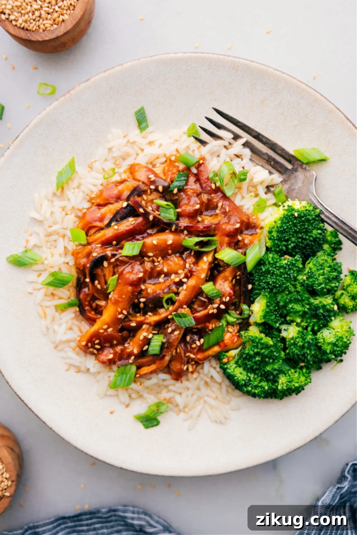 Delicious Honey Garlic Chicken Thighs Tender Honey Garlic Chicken Thighs glistening with a sweet and savory sauce, ready to be served as a simple yet incredibly flavorful meal.