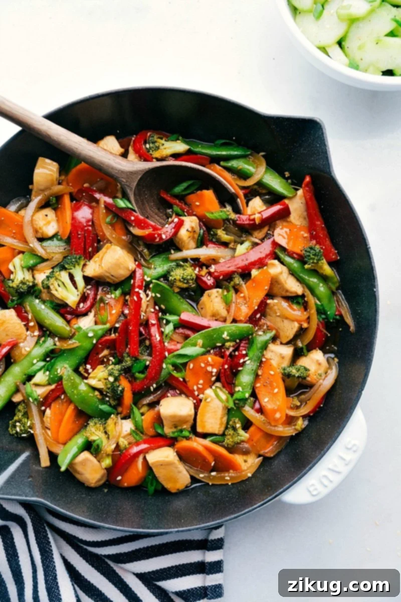 Fast and Flavorful Chicken Stir Fry Chicken stir fry in a large skillet, brimming with colorful sautéed vegetables and savory chicken, coated in a delicious sauce and ready in 30 minutes.