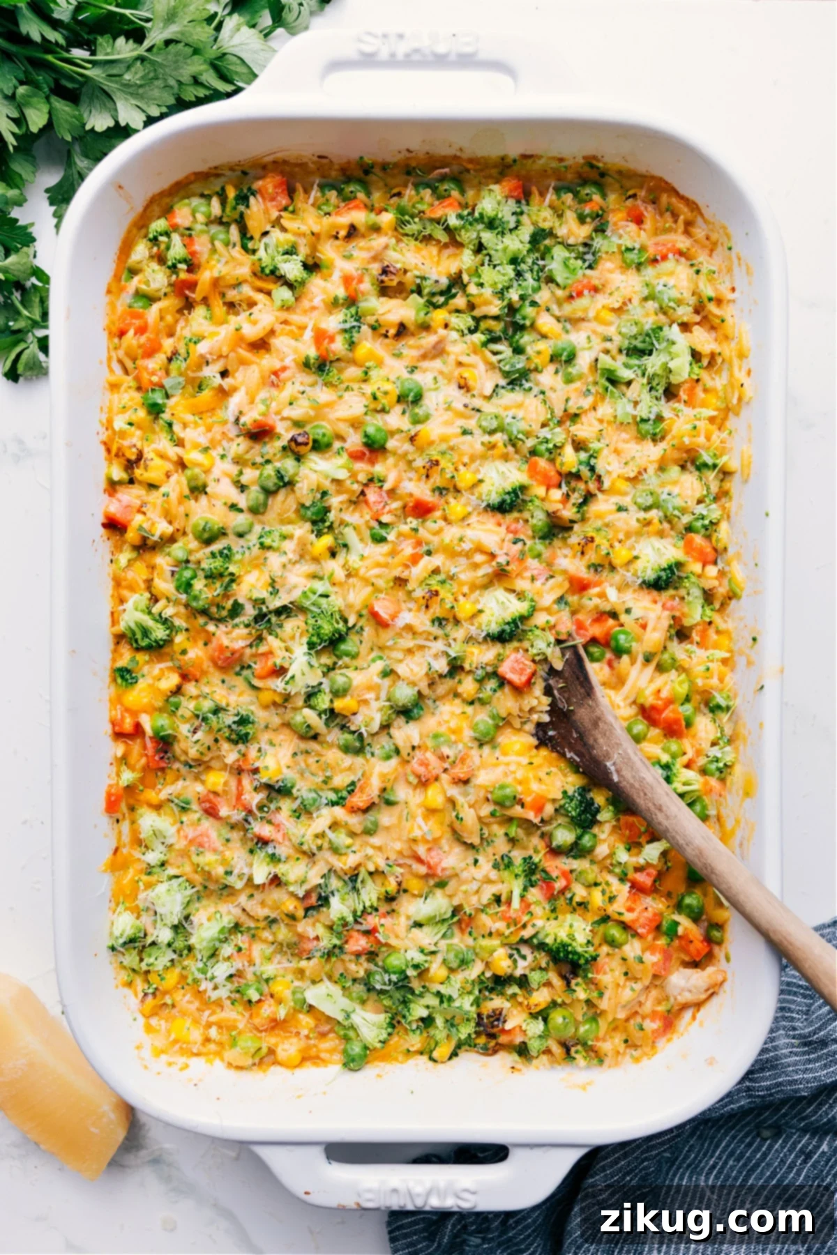 One Pan Chicken Orzo Bake for Easy Dinners A creamy, cheesy one-pan chicken orzo bake, rich with tender chicken, vibrant vegetables, and perfectly cooked pasta, ideal for a comforting and easy meal.