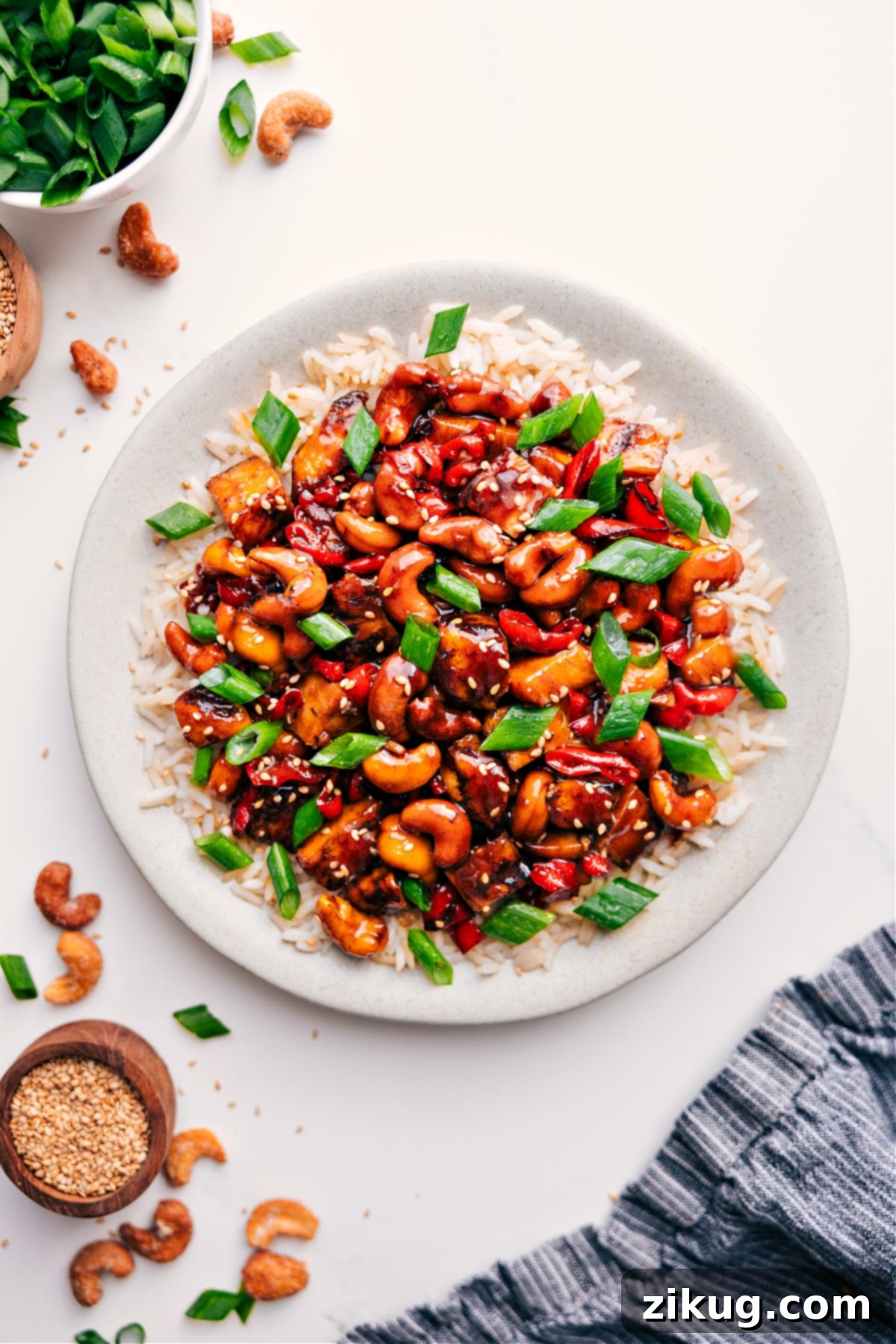 Quick & Flavorful Cashew Chicken A vibrant quick cashew chicken dish featuring tender chicken, crunchy cashews, and sautéed peppers coated in a savory stir-fry sauce, ready in under 20 minutes.