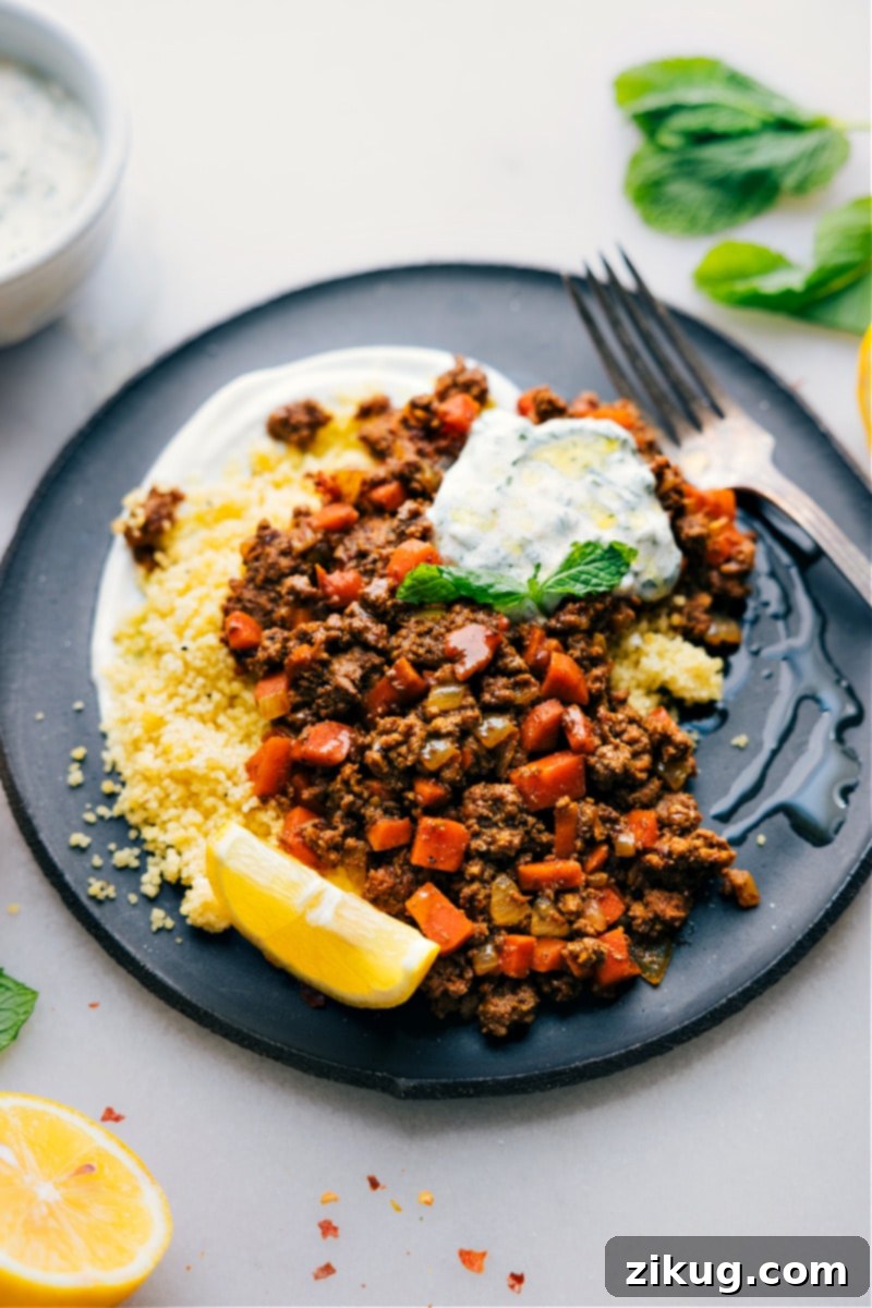 Middle Eastern Ground Beef Bowls Middle Eastern ground beef bowls, beautifully plated with a dollop of mint yogurt sauce and fresh herbs.
