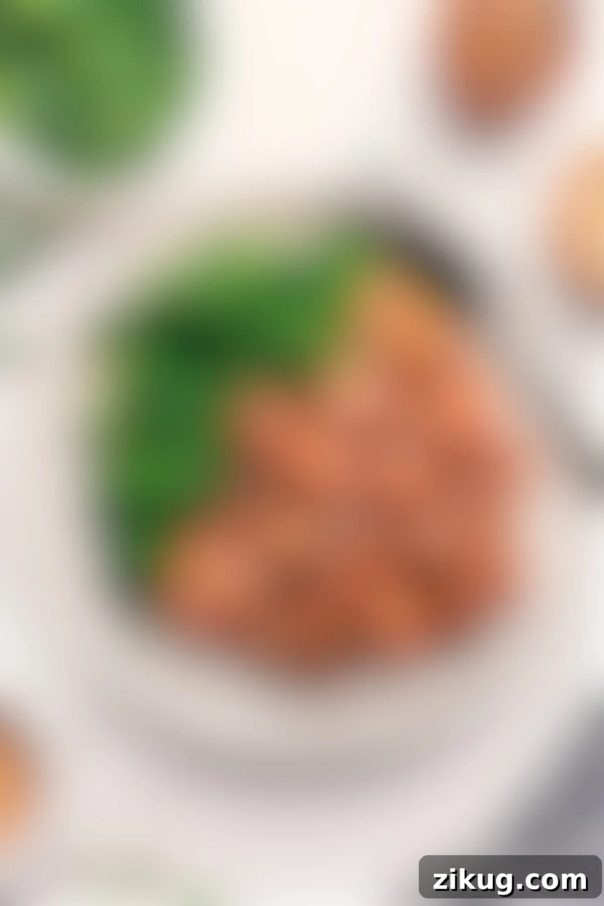 Panda Express Orange Chicken Copycat Recipe Panda Express orange chicken copycat recipe, glistening with sauce, served on a bed of fluffy white rice with fresh steamed broccoli on the side.