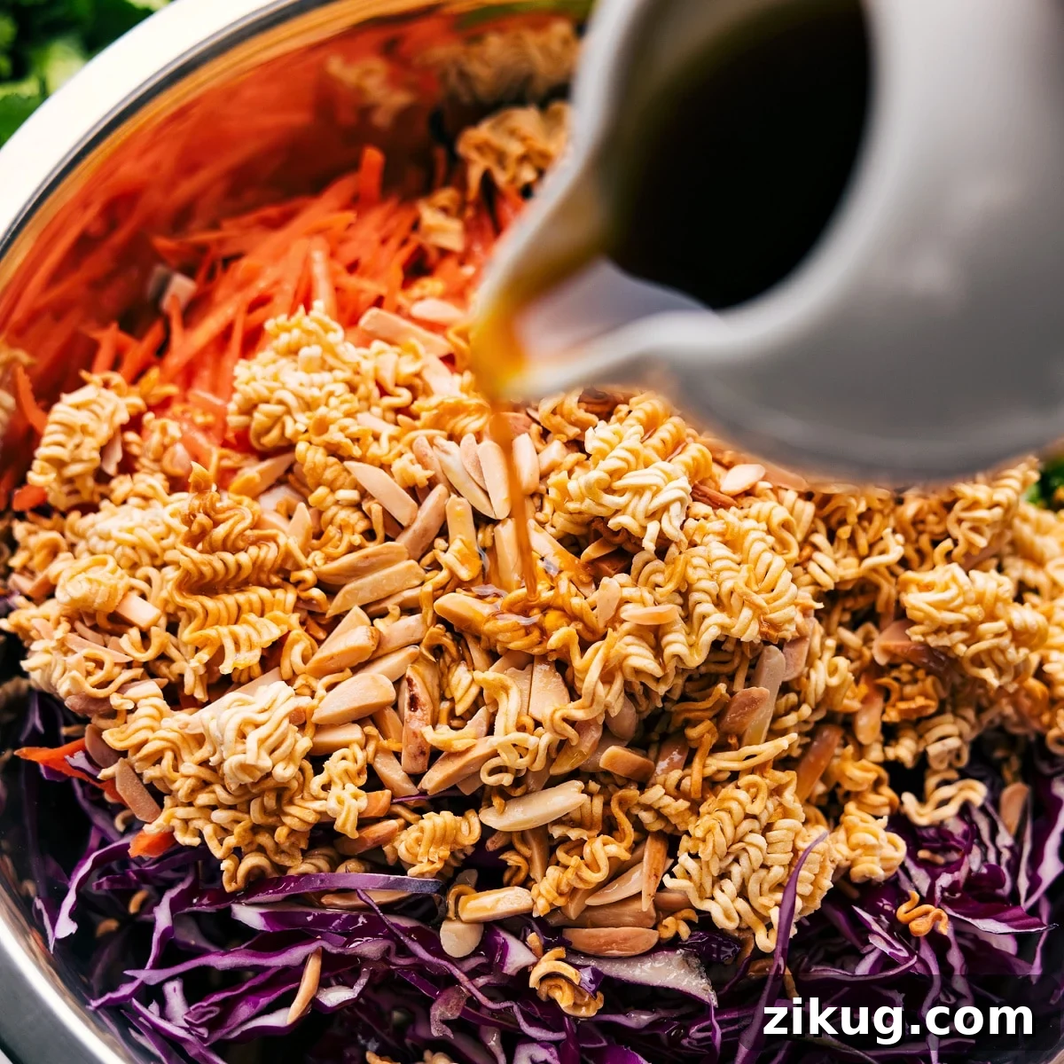 Crunchy And Flavorful Ramen Noodle Salad Recipe All the ingredients in this ramen noodle salad recipe added to a bowl and tossed with the dressing.