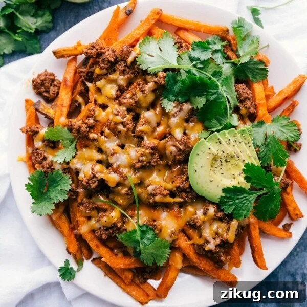 Crispy Taco Salad with Zesty Lime Dressing 3 Loaded taco fries, a savory and satisfying dish.