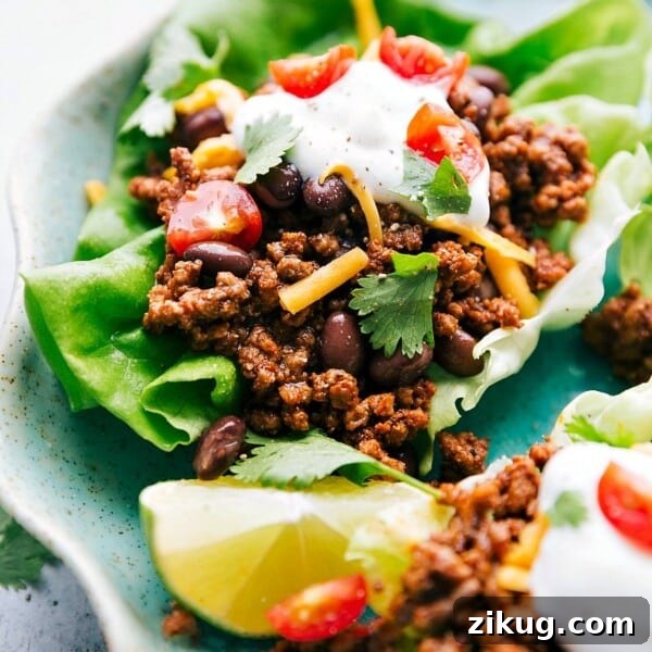 Crispy Taco Salad with Zesty Lime Dressing 5 Ready-to-eat taco lettuce wraps on a plate, offering a healthy twist on a classic favorite meal.