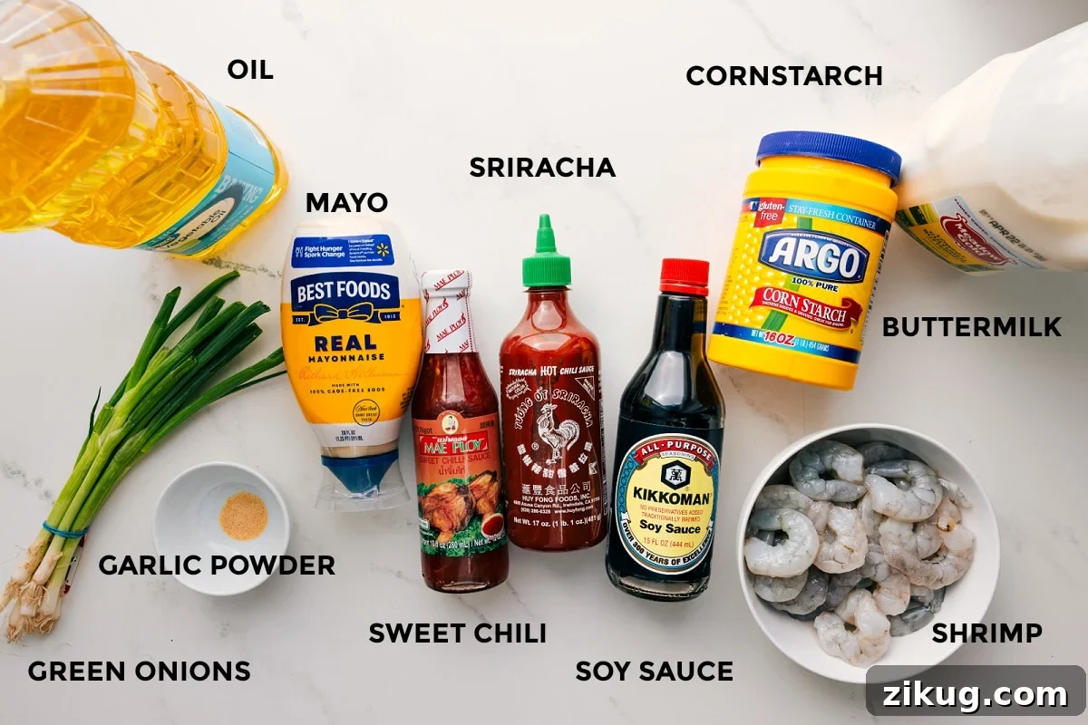 Ingredients In This Bang Bang Shrimp All the ingredients in this recipe prepped out for easy assembly including the oil, garlic powder, green onions, mayo, sweet chili, sriracha, soy sauce, cornstarch, buttermilk, and shrimp.