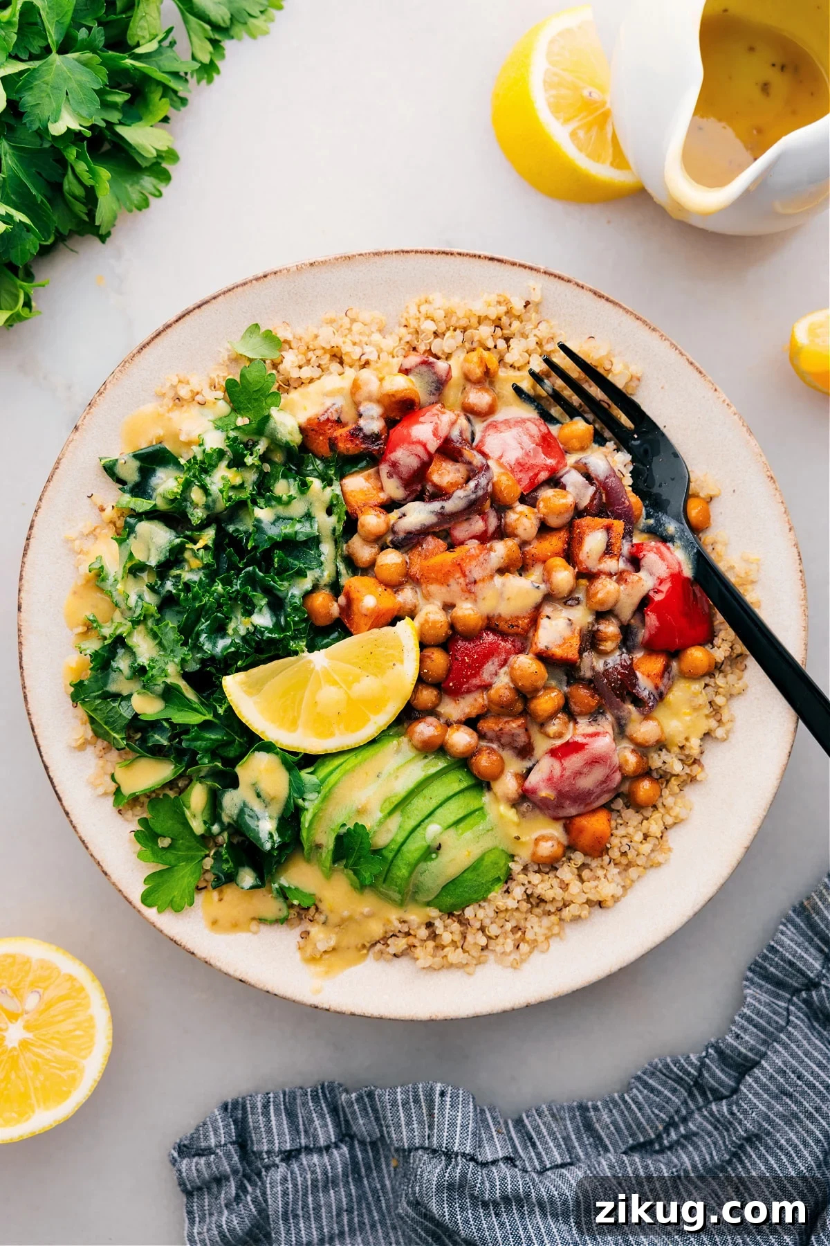 Big Buddha Bowl Buddha bowl over quinoa, topped with a flavorful sauce.