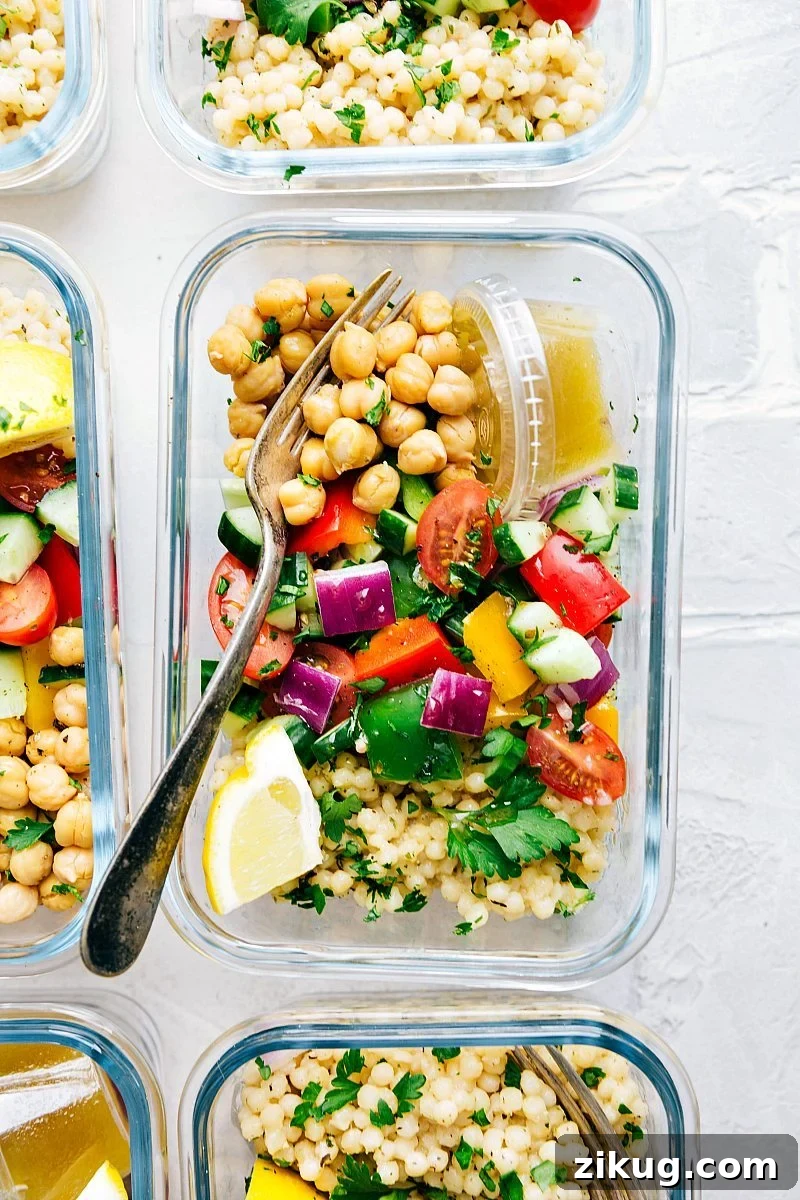Greek Couscous Salad Greek couscous salad in meal prep containers.