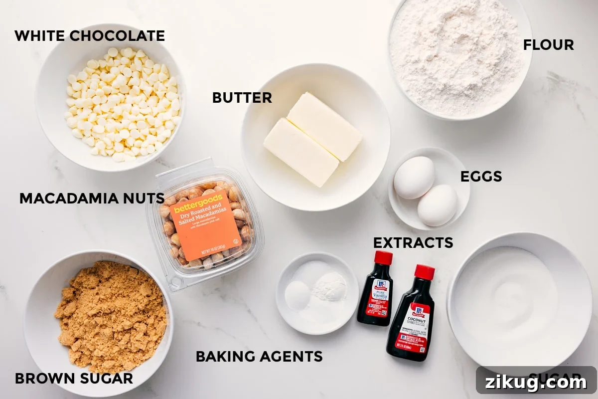 Ingredients In This Recipe For Macadamia Nut White Chocolate Cookies All the ingredients in this recipe prepped out for easy assembly including the white chocolate, macadamia nuts, brown sugar, butter, flour, eggs, extracts, sugar, and baking agents.