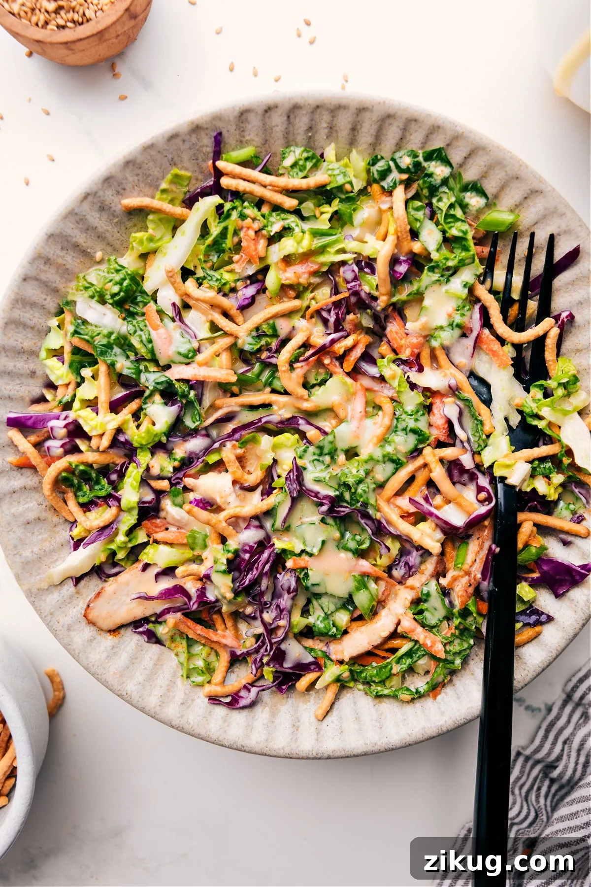 Asian Chicken Salad Asian chicken salad in a bowl dressed with the best creamy dressing.