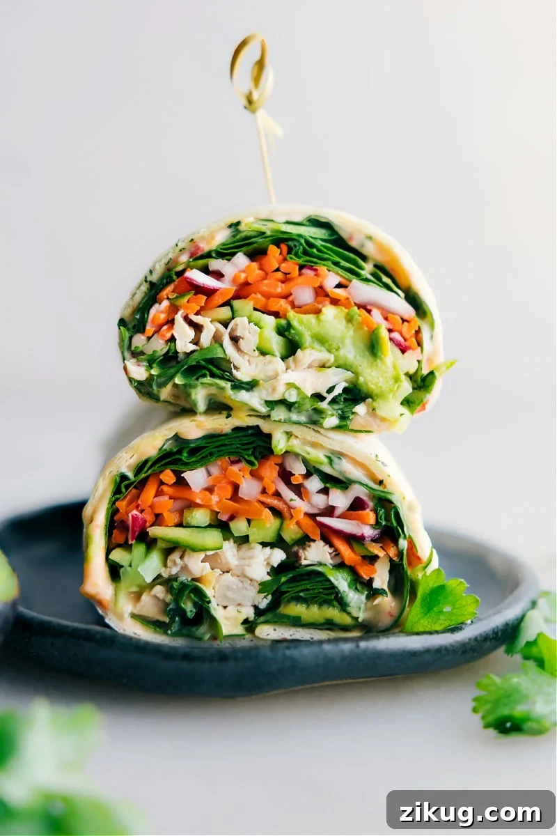 Thai Chicken Wraps Thai chicken wraps stacked on top of each other.