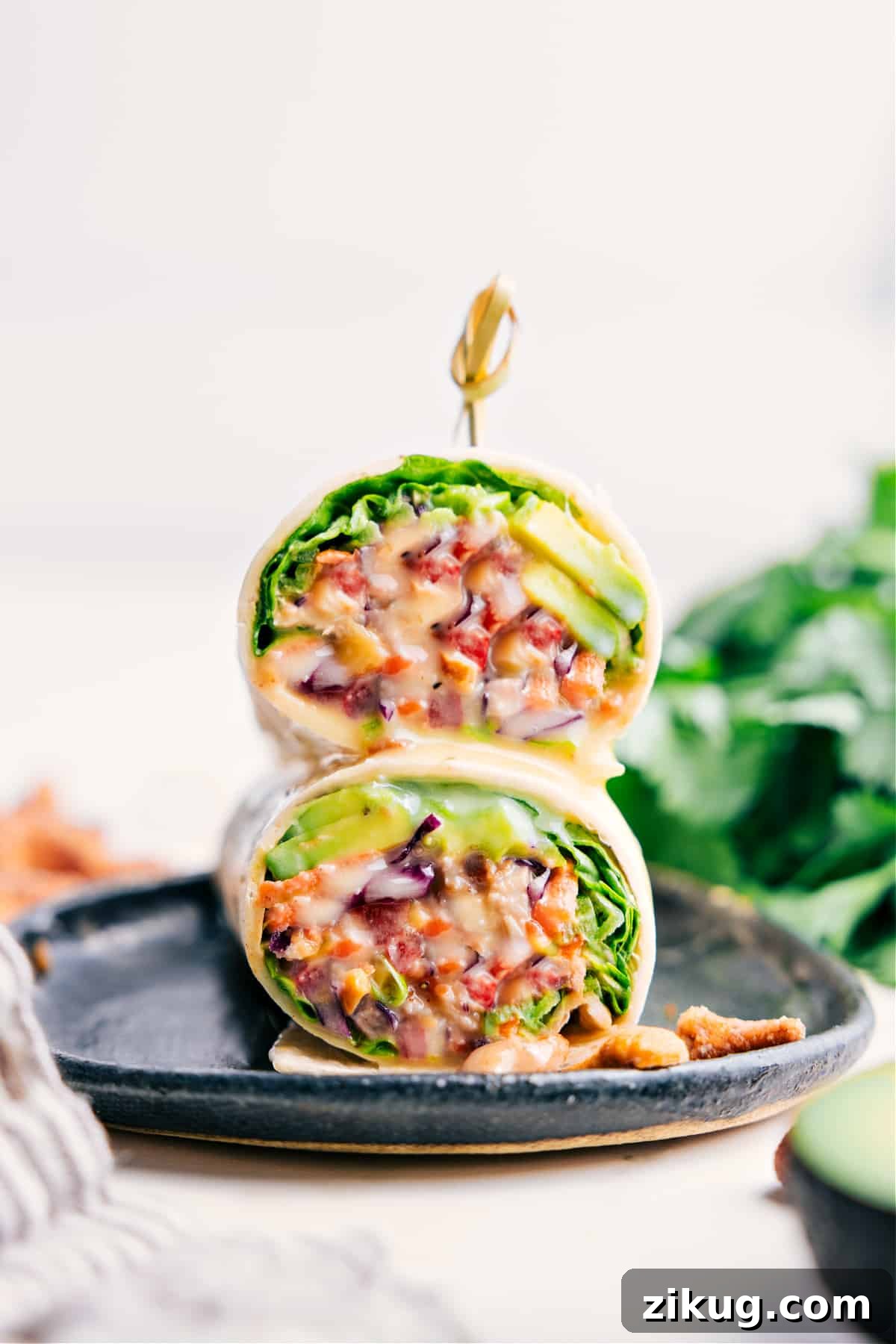 Cashew Chicken Wraps Asian chicken recipes: Cashew chicken wraps stacked on top of each other.