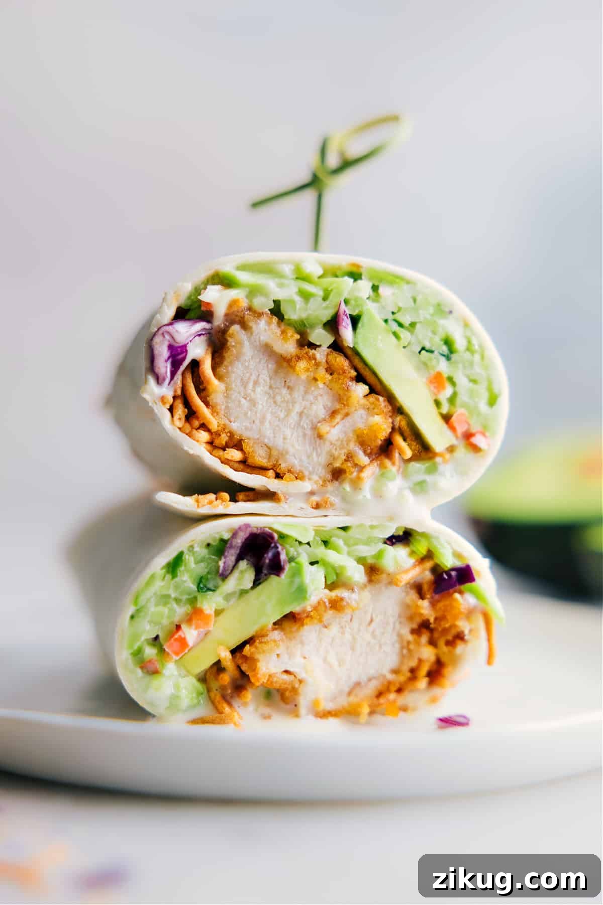Asian Chicken Wrap Asian Chicken Wraps stacked on top of each other.