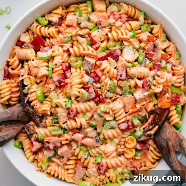 Caprese Pasta Salad with Cherry Tomatoes, Mozzarella & Basil 6 Buffalo Chicken Pasta Salad in a bowl.
