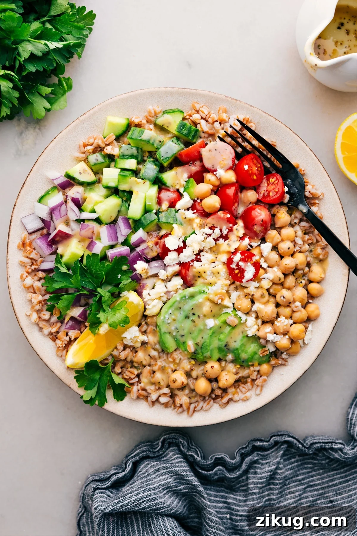 Grain Bowl Grain bowl over farro with fresh veggies and chickpeas.