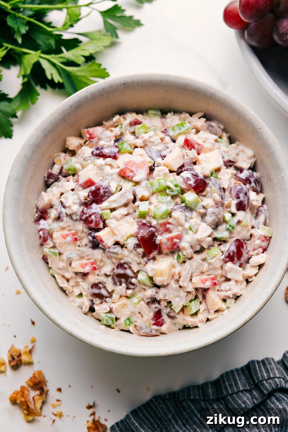 Waldorf Chicken Salad In A Bowl Waldorf Chicken Salad in a bowl tossed together and ready to enjoy.