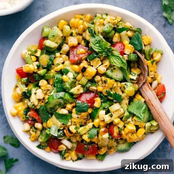 Copycat Hamburger Helper: Creamy One-Pot Ground Beef Skillet 8 Fresh corn salad in a bowl with a serving spoon.