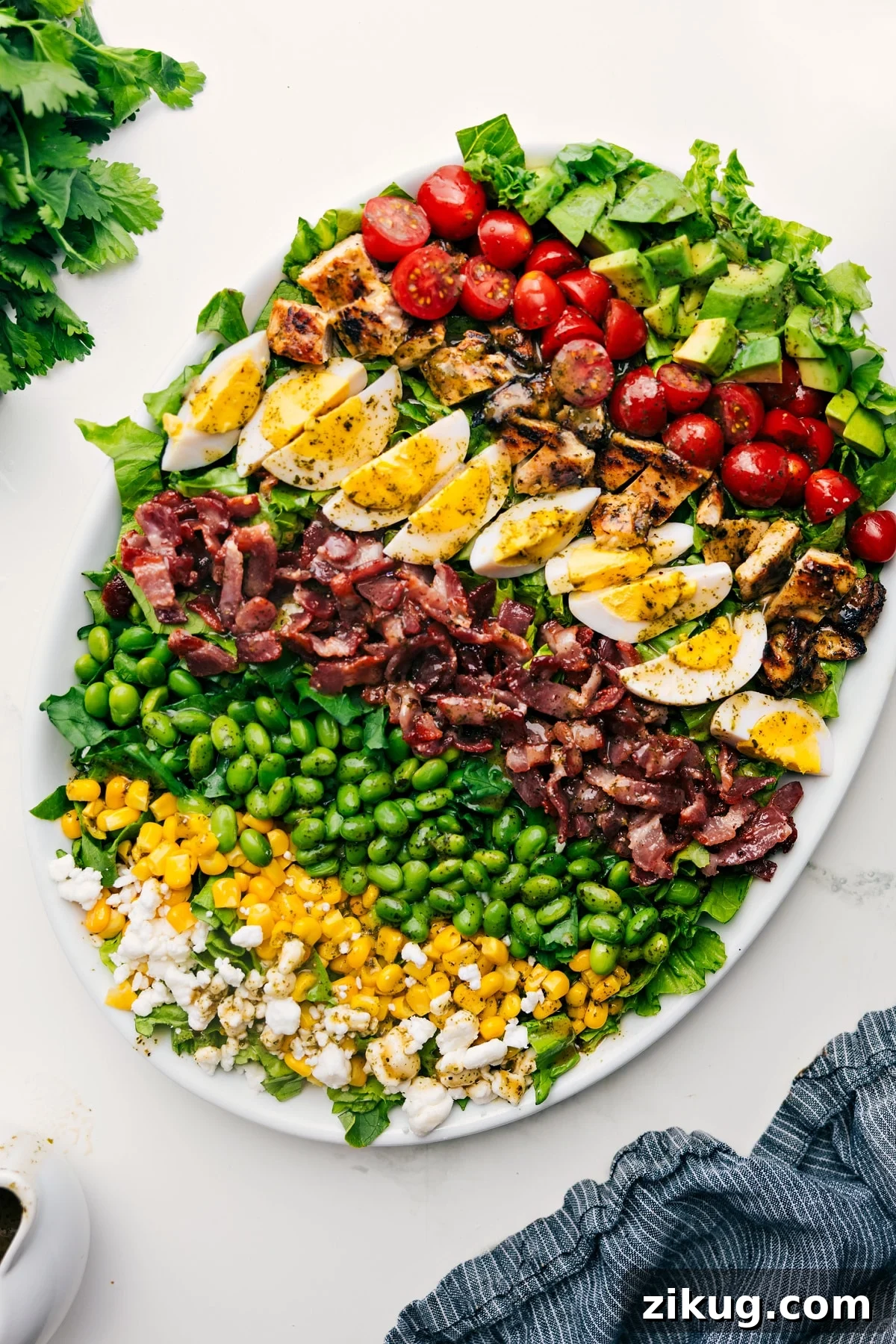 Fresh And Flavorful Cobb Salad Recipe Cobb Salad Recipe served on a platter, dressed and ready to enjoy.