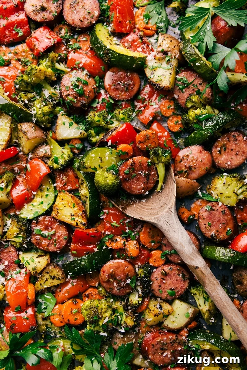 One Pan Italian Sausage And Veggies A tray featuring the perfectly cooked and seasoned one pan Italian sausage and veggies recipe, where all the flavors come together to create the perfect combination of flavor and texture.