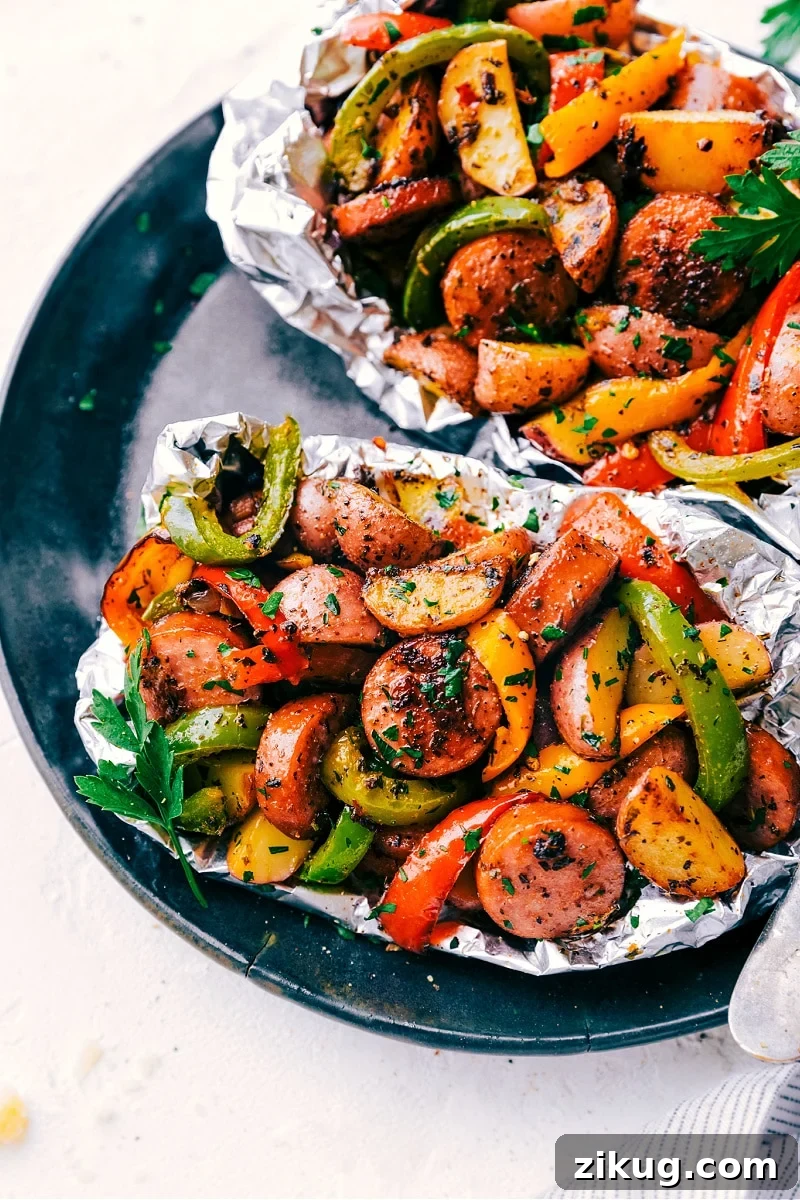 Foil Pack Italian Sausage And Veggies Italian recipes foil pack sausage and veggies with peppers, mushrooms, potatoes, garlic, and onions.