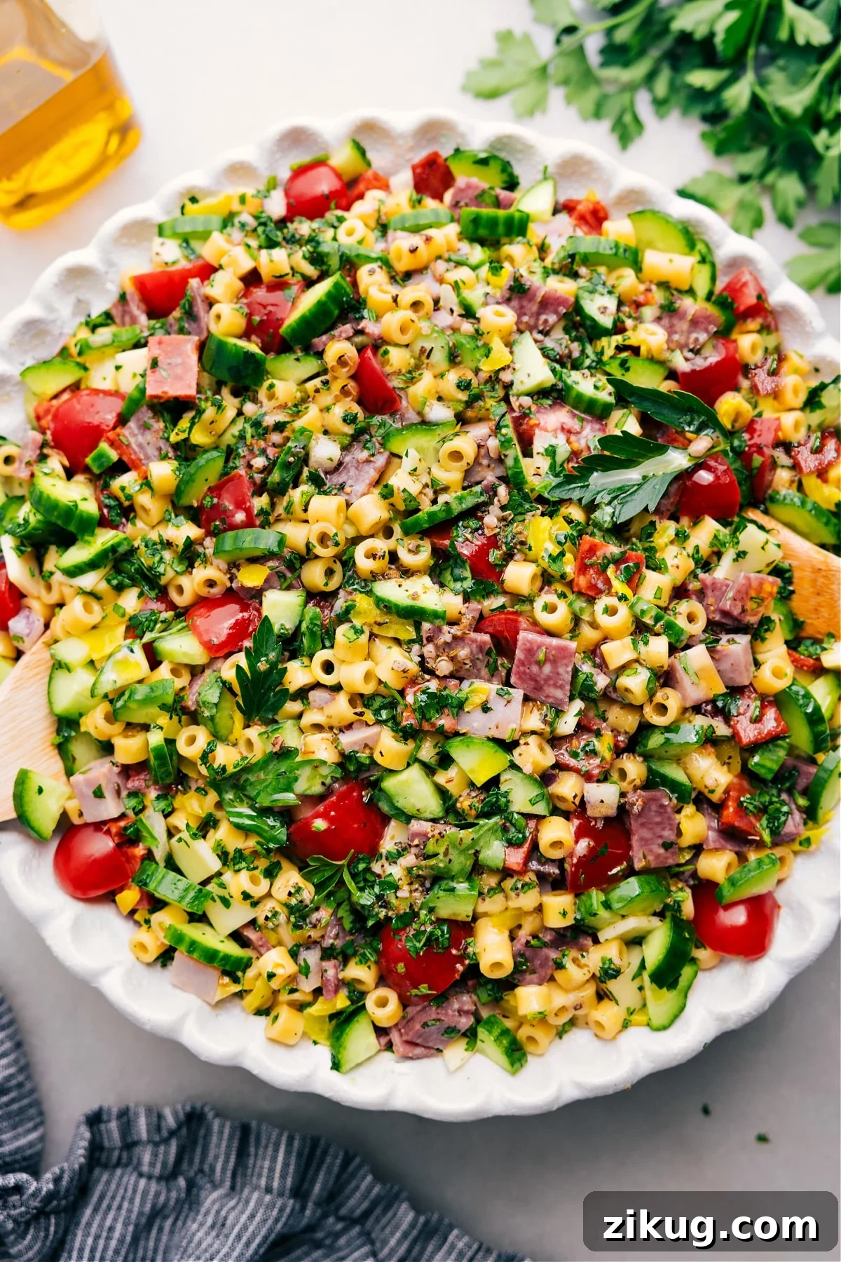 Italian Grinder Pasta Salad Grinder pasta salad with meats, cheese, peppers, pasta, and creamy dressing.