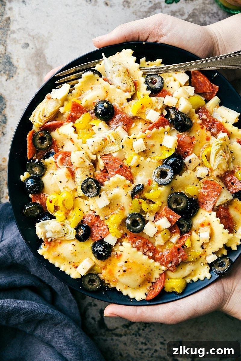 Ravioli Salad Italian recipes ravioli salad with cheese ravioli, pepperoni, provolone, artichokes, olives, and dressing.