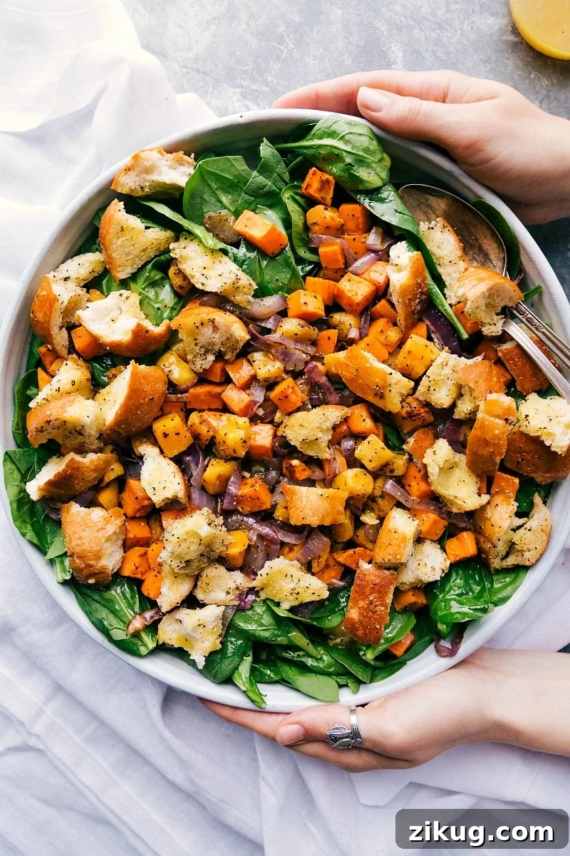 Roasted Panzanella Salad Roasted veggie salad in a giant bowl, delicious and filling, ready to be served.