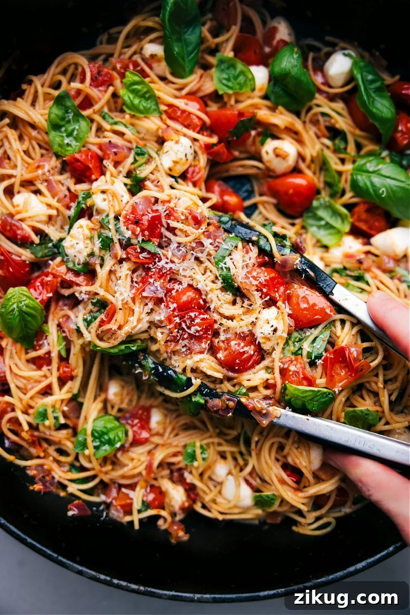 Caprese Pasta Italian recipes Caprese pasta with tomatoes, basil, mozzarella, balsamic, and angel hair pasta.