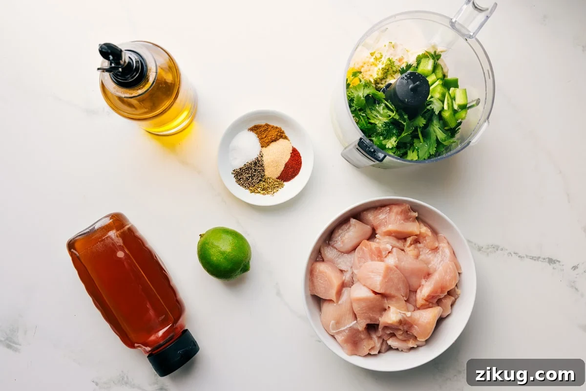 Juicy Grilled Chicken Skewers with Garlic and Lemon 4 All the ingredients in this recipe prepped out for easy assembly including the honey, oil, lime, seasonings, chicken, and sauce.