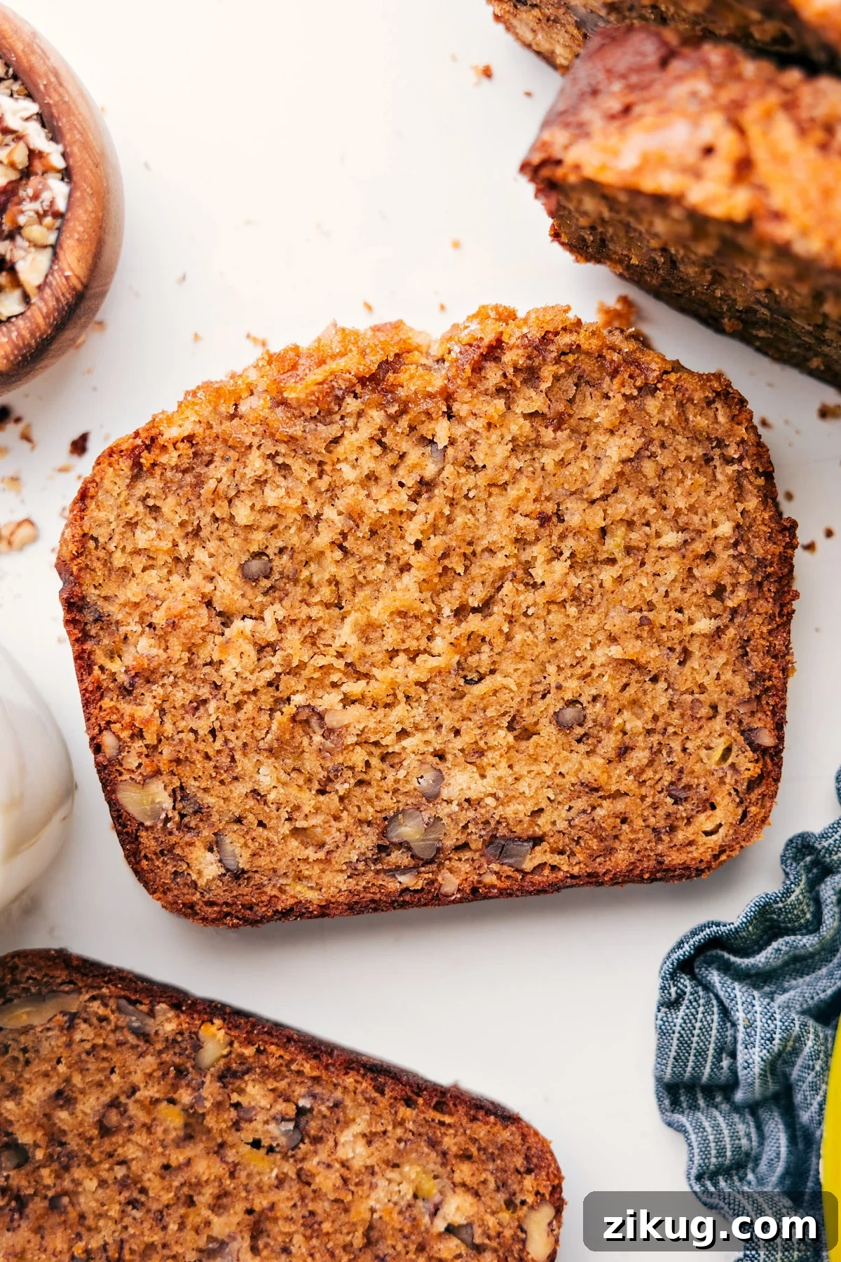 Freshly Baked Banana Nut Bread Recipe Slice of this banana nut bread recipe on a plate, ready to enjoy.